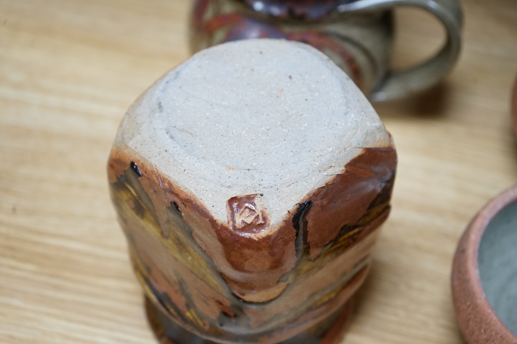 A large group of 20th century signed and unsigned Studio pottery, tallest 23cm high